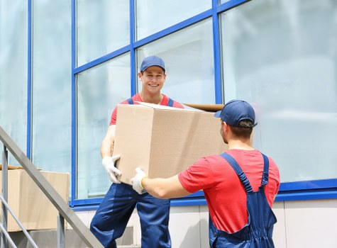 Local team loading furniture for urgent removals in West London