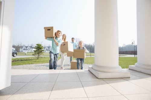 Removal van and moving boxes for a house move in Ealing