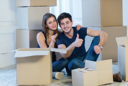 Moving van and team managing access challenges in Ealing apartment move