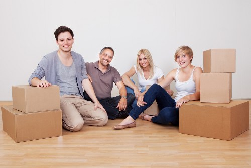 Local removals crew handling stairs during an Ealing flat move