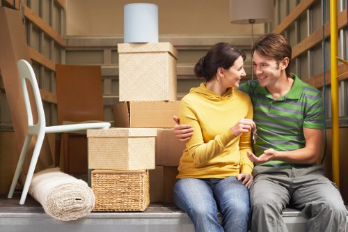 Packed boxes and furniture loaded for an Ealing move