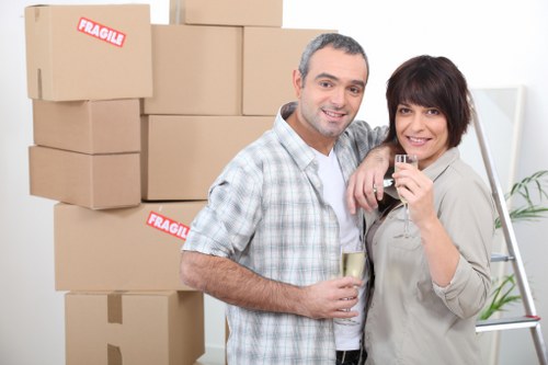 Careful furniture loading during a move in Ealing residential street